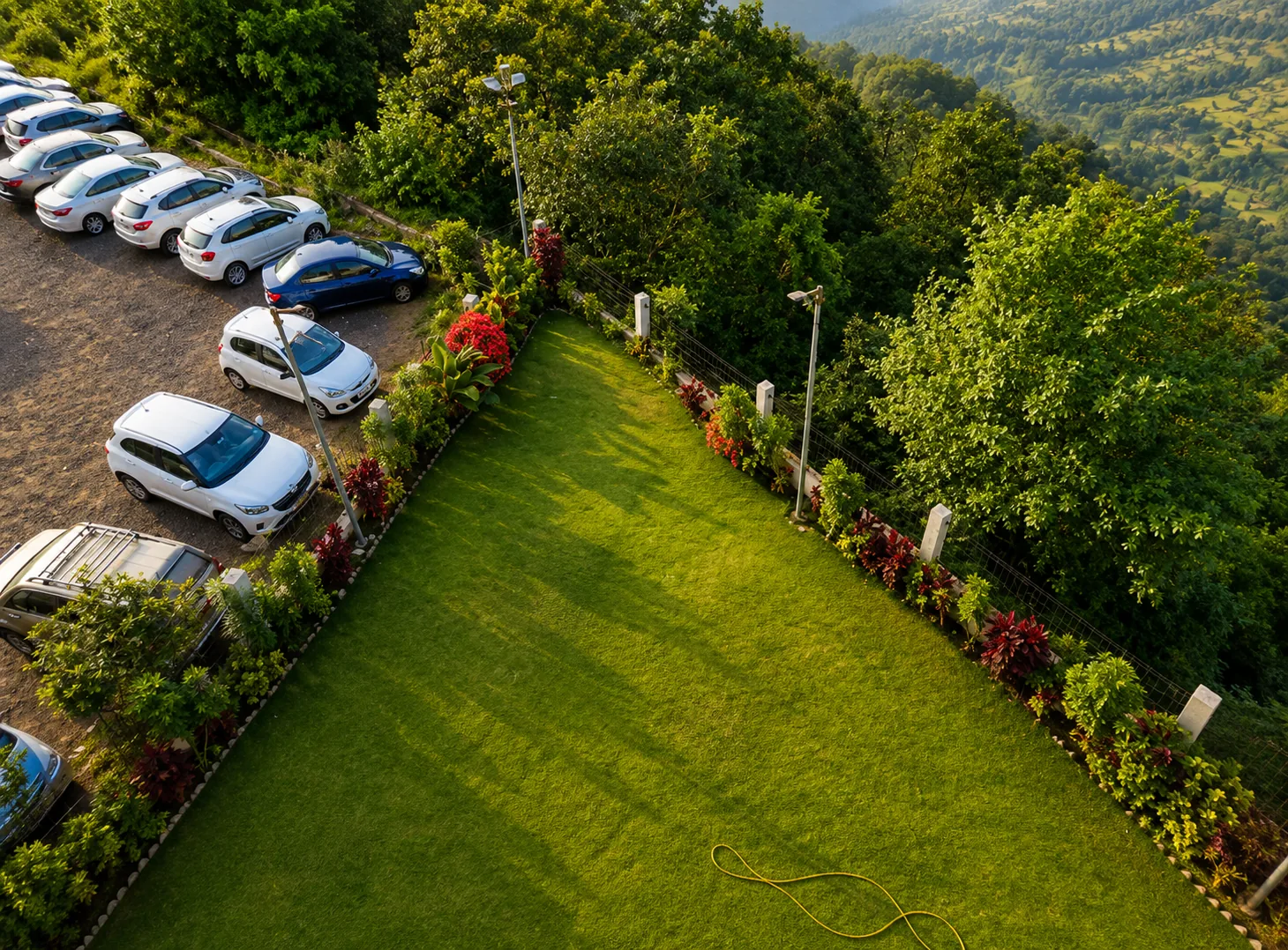 Green lawn and on-site parking area