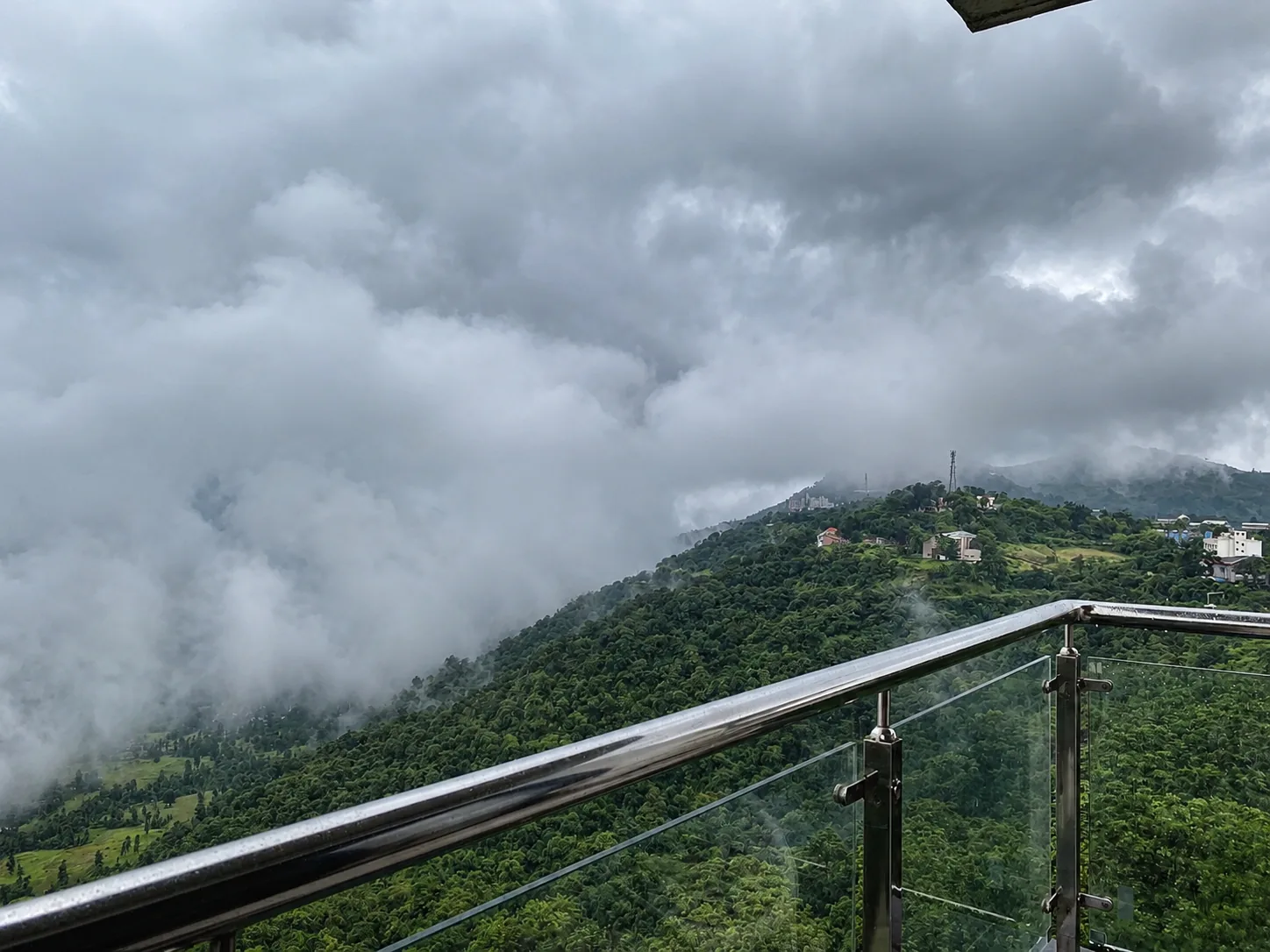 Misty monsoon landscape viewed from Toran Hill Resort
